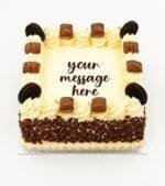 Kinder and Oreo fresh cream birthday cake with chocolate flakes, Kinder chocolate bars, Oreo biscuits, and personalised message