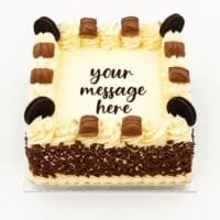 Kinder and Oreo fresh cream birthday cake with chocolate flakes, Kinder chocolate bars, Oreo biscuits, and personalised message