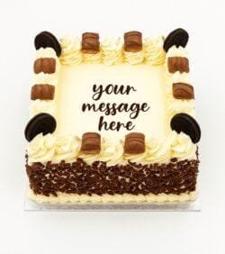 Kinder and Oreo fresh cream birthday cake with chocolate flakes, Kinder chocolate bars, Oreo biscuits, and personalised message