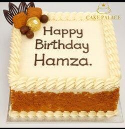 Egg-free Lotus Biscoff birthday cake with Biscoff biscuits, Ferrero Rocher chocolates, chocolate decorations, vanilla buttercream border and personalised birthday message.