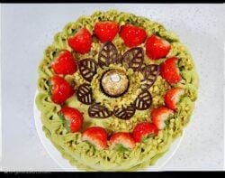 Round strawberry,fans and Ferrero pistachio cream cake