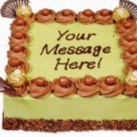 Egg-free pistachio fresh cream cake decorated with Ferrero Rocher chocolates, chocolate curls, chocolate pearls, and personalised message