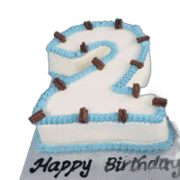 Egg Free number 2 birthday cake with blue piping, chocolate flakes and personalised message, available in any number 0–9 from Cake Palace Sheffield