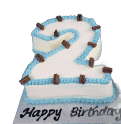 Egg Free number 2 birthday cake with blue piping, chocolate flakes and personalised message, available in any number 0–9 from Cake Palace Sheffield