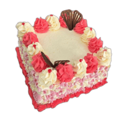 Custom square birthday cake with pink and white decorations, fresh strawberries and personalised chocolate writing