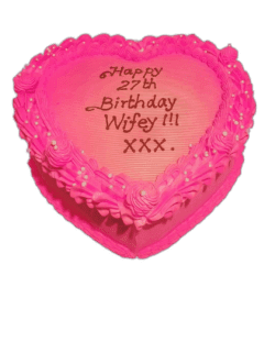 Egg Free Pink Heart Celebration Cake with a vibrant pink cream finish, decorative cream border, edible pearls and a personalised message.