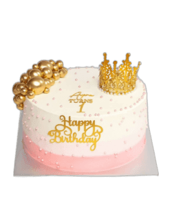 Pink and gold princess crown birthday cake decorated with a luxury gold crown topper, gold spheres, edible pearl details and personalised birthday message.