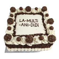 Egg Free Ferrero celebration cake decorated with Ferrero chocolates, chocolate balls, chocolate sprinkles, and a personalised message