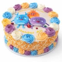 Top view of Colourful Kids Photo Birthday Cake featuring an edible cartoon character image, pastel fresh cream swirls, and personalised birthday design.