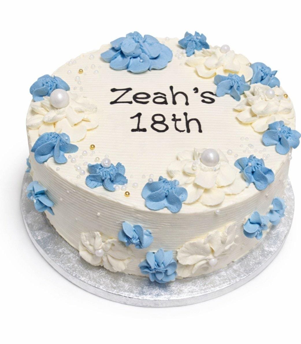 Blue & White Floral Fresh Cream Birthday Cake front Top view of a tall fresh cream birthday cake featuring blue and white floral decorations, pearl accents, and a personalised birthday message.