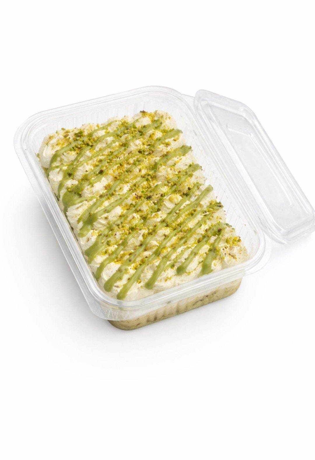 Pistachio Milk Cake Classic Pistachio: whipped cream, pistachio sauce drizzle, chopped pistachios. Royal Pistachio: cream rosettes, whole pistachios, edible gold flak