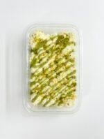 Pistachio Rose: pistachio drizzle with dried rose petals. Green Swirl: alternating white and pistachio cream lines. Premium Nut Mix: pistachio, almond slivers, white chocolate curls. Minimal Elegant: smooth cream, center pistachio mound, thin green drizzle. Pistachio Crunch: caramelized pistachio crumble on top. Layered Pattern: diagonal pistachio sauce with chopped nuts between each line.
