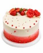 Top view of Tall Strawberry & Rose Celebration Cake with fresh strawberries, handcrafted red cream roses, elegant red and gold sugar pearls, and smooth fresh cream finish.