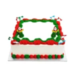 Classic Christmas celebration sheet cake with festive red and green buttercream decoration.