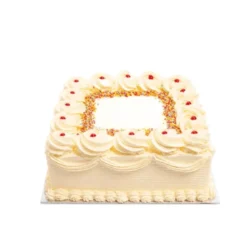 Square fresh cream celebration cake with smooth piped cream icing, rainbow sprinkles border, classic jam dots, decorative cream swirls, and space for a personalised birthday or celebration message, handmade by Cake Palace UK.