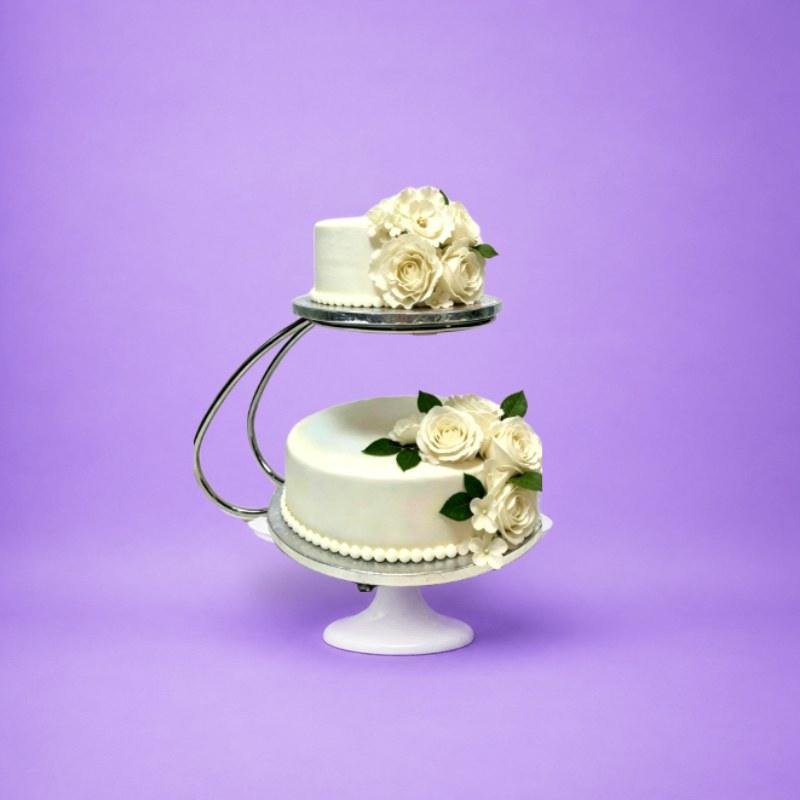 Ivory Rose Floating Wedding Cake Ivory rose floating wedding cake with fresh cream finish by Cake Palace Luxury two-tier floating wedding cake decorated with ivory roses